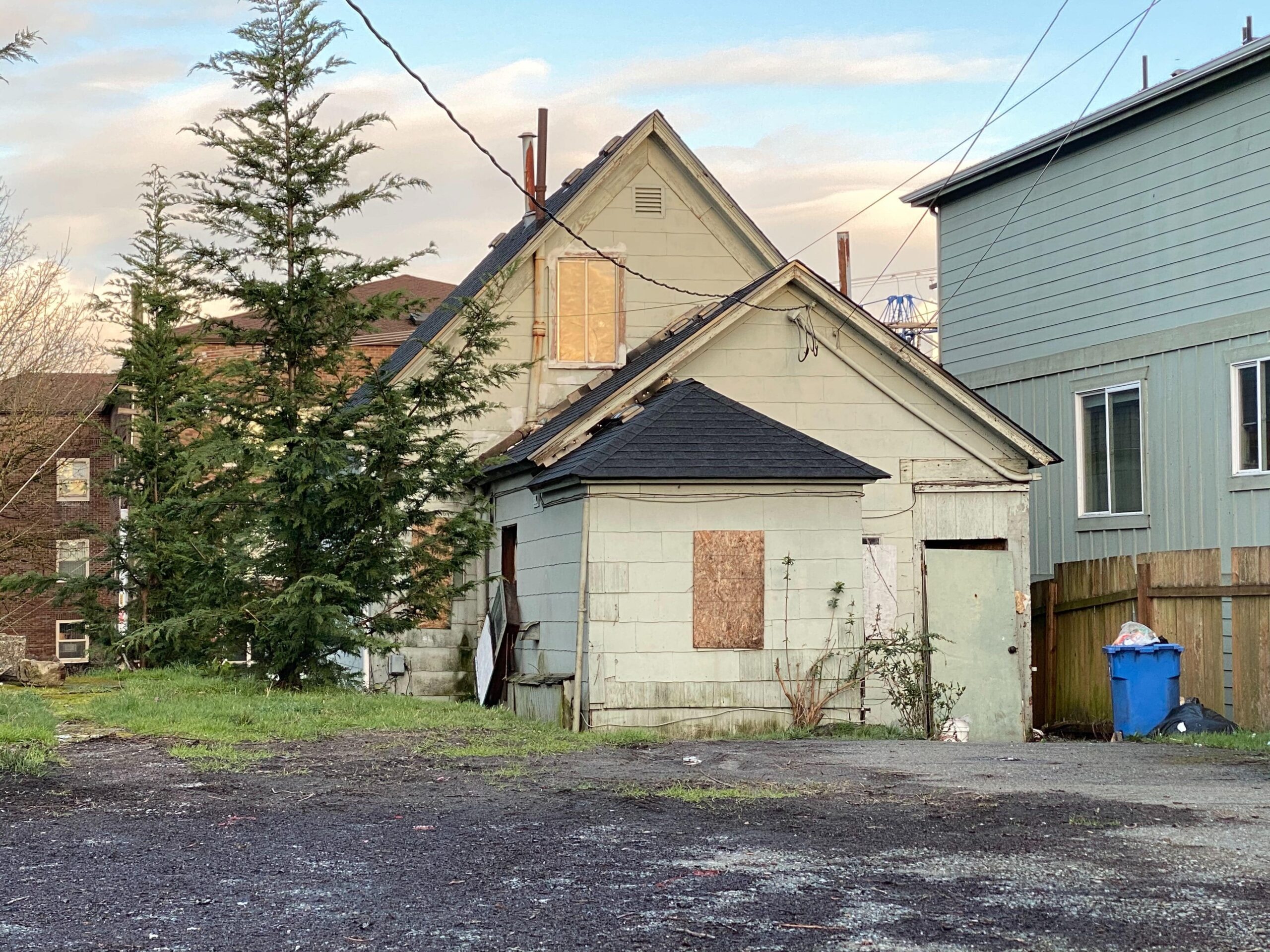Exterior of an older home listed to sell your house as is